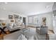 Light and airy living room with comfortable seating and large windows at 2538 Roswell Ave, Charlotte, NC 28209