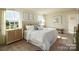 King-size bed, neutral decor, and ample closet space at 301 Brinkley Dr # Lot 103, Kings Mountain, NC 28086