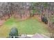 Large backyard surrounded by lush trees and nature at 302 Mccrary Rd, Mooresville, NC 28117