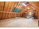 Unfinished attic with shelving and storage at 302 Mccrary Rd, Mooresville, NC 28117