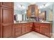 Double vanity bathroom with granite countertops and large cabinets at 302 Mccrary Rd, Mooresville, NC 28117