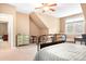 Bedroom with a dresser, desk, and a metal bed frame at 302 Mccrary Rd, Mooresville, NC 28117