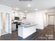 Modern kitchen with gray cabinets, granite counters and island at 307 Brinkley Dr, Kings Mountain, NC 28086