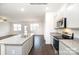 Modern kitchen with gray cabinets, granite countertops and island at 307 Brinkley Dr, Kings Mountain, NC 28086