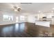 Open concept living room and kitchen with hardwood floors at 307 Brinkley Dr, Kings Mountain, NC 28086