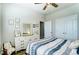 Bedroom with white dresser and patterned bedding at 4063 Whittier Ln, Fort Mill, SC 29708