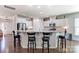 Modern kitchen with white cabinets, granite countertops, and island with seating at 4063 Whittier Ln, Fort Mill, SC 29708