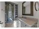 Bathroom with glass shower, floating vanity, and modern fixtures at 413 Eastover Rd, Charlotte, NC 28207