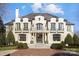 Stunning two-story brick home with a classic design and landscaped grounds at 413 Eastover Rd, Charlotte, NC 28207