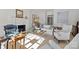 Bright living room featuring a fireplace and comfortable seating at 413 Eastover Rd, Charlotte, NC 28207
