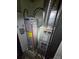 Mechanical room with water heater and HVAC unit at 4718 Americana Ave, Charlotte, NC 28215