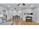 Dining area with a table for four and hardwood floors at 5020 Sardis Rd # I, Charlotte, NC 28270