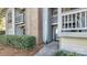Condo building exterior showing entrance and landscaping at 5020 Sardis Rd # I, Charlotte, NC 28270