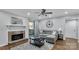 Living room features a fireplace, sectional sofa and hardwood floors at 5020 Sardis Rd # I, Charlotte, NC 28270