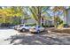 Parking lot view of condo building with some cars parked at 5020 Sardis Rd # I, Charlotte, NC 28270
