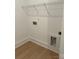 Dedicated laundry area with overhead shelving and utility connections at 5213 Mint Harbor Way # 0351, Charlotte, NC 28269