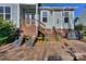 Inviting backyard featuring a paved patio, stylish chairs, and an outdoor grill for enjoyable outdoor living at 724 Mercer Pl, Huntersville, NC 28078