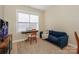 Cozy bedroom with a comfortable couch, piano, and a window providing natural light at 724 Mercer Pl, Huntersville, NC 28078