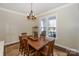 Dining room with hardwood floors and large windows at 724 Mercer Pl, Huntersville, NC 28078