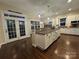 Beautiful open kitchen featuring a large island, granite countertops, and ample cabinet space at 724 Mercer Pl, Huntersville, NC 28078