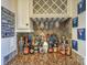 Wet bar with wine glasses and liquor bottles at 724 Mercer Pl, Huntersville, NC 28078