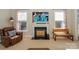 Living room with fireplace and a comfortable seating area at 724 Mercer Pl, Huntersville, NC 28078