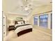 Inviting main bedroom with neutral tones, comfortable bed, vaulted ceiling, and large window at 724 Mercer Pl, Huntersville, NC 28078