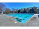 Large community pool features lap lanes, clear blue water, and a spacious deck for lounging and relaxing at 724 Mercer Pl, Huntersville, NC 28078