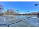 Well-maintained tennis courts are ready for a match and offers a fun way to stay active in the community at 724 Mercer Pl, Huntersville, NC 28078