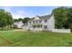 Traditional home with a large front yard, inviting porch and well-maintained landscaping at 7545 Haley Ln, Indian Land, SC 29707
