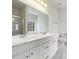 Bathroom with double vanity, marble floor, and a walk-in shower at 9153 Leah Meadow Ln, Charlotte, NC 28227