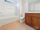 Clean bathroom with tub, toilet and vanity at 9153 Leah Meadow Ln, Charlotte, NC 28227