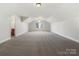 Spacious bonus room with window and bathroom access at 9153 Leah Meadow Ln, Charlotte, NC 28227