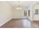Bright dining room with tile floors and window view at 9153 Leah Meadow Ln, Charlotte, NC 28227