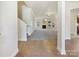 Bright entryway with tile flooring leading to living room at 9153 Leah Meadow Ln, Charlotte, NC 28227