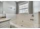 Bathroom features a large garden tub, granite vanity, and neutral tile at 9439 Bonnie Briar Cir, Charlotte, NC 28277