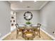 Charming dining area with round table and built-in shelving at 9439 Bonnie Briar Cir, Charlotte, NC 28277