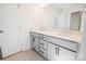 Double vanity bathroom with gray cabinets and quartz counters at 0000 Crown Ter, Hickory, NC 28601