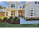 Inviting front entrance with a covered porch and stone accents at 0000 Crown Ter, Hickory, NC 28601