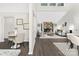 Open concept living area with a fireplace and lots of natural light next to a breakfast nook at 10912 Treebark Dr, Charlotte, NC 28226