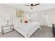 This light and bright main bedroom has a walk-in closet and attached bathroom at 10912 Treebark Dr, Charlotte, NC 28226
