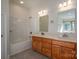 Bathroom with double vanity and a shower/tub combo at 115 Cloverhill Rd, Mooresville, NC 28117