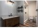 Modern bathroom with stylish vanity, shower, and toilet at 115 Cloverhill Rd, Mooresville, NC 28117