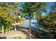 Stunning lake view with private dock and fall foliage at 115 Cloverhill Rd, Mooresville, NC 28117