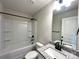Bathroom with granite countertop vanity, full-sized mirror, and shower and tub combo at 129 Sharon Rd, York, SC 29745