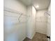 Walk-in closet offering ample storage with wire shelving and neutral walls at 129 Sharon Rd, York, SC 29745
