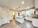 Kitchen features an island, modern appliances, and ample cabinet space at 129 Sharon Rd, York, SC 29745