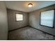 Spacious bedroom with gray walls and carpet at 1401 Lasalle St, Charlotte, NC 28216