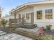 Inviting front porch with stone steps at 1408 Edgewater Dr, Charlotte, NC 28210