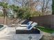 Peaceful patio with fire pit and lounge chairs at 1408 Edgewater Dr, Charlotte, NC 28210